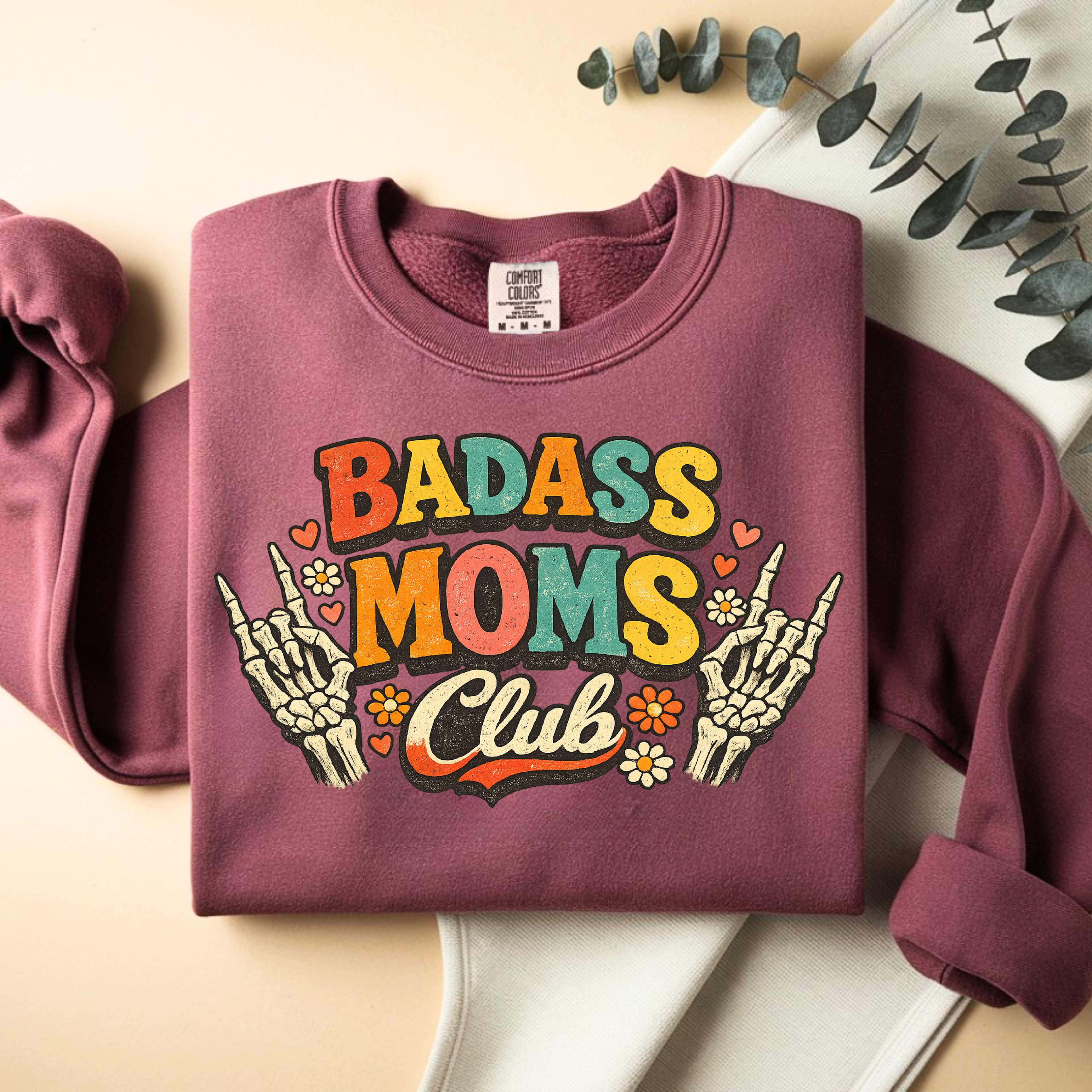 Crimson Badass Moms Club sweatshirt folded, cozy trendy mom clothing gift idea