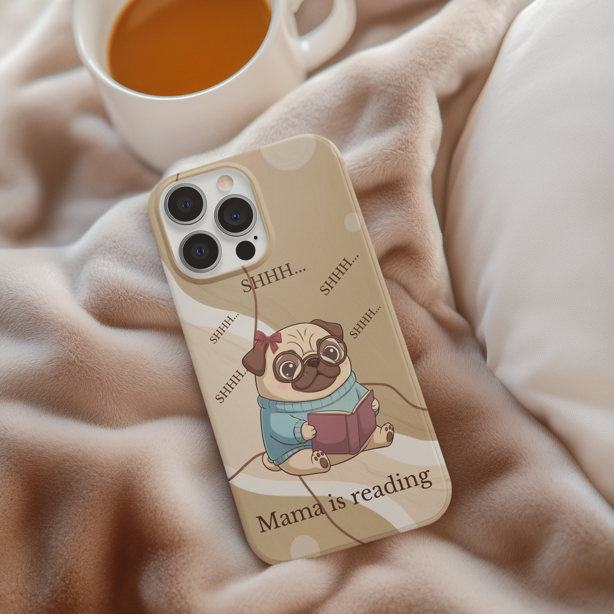 Cute pug reading book phone case styled on cozy blanket, perfect gift for book lover moms