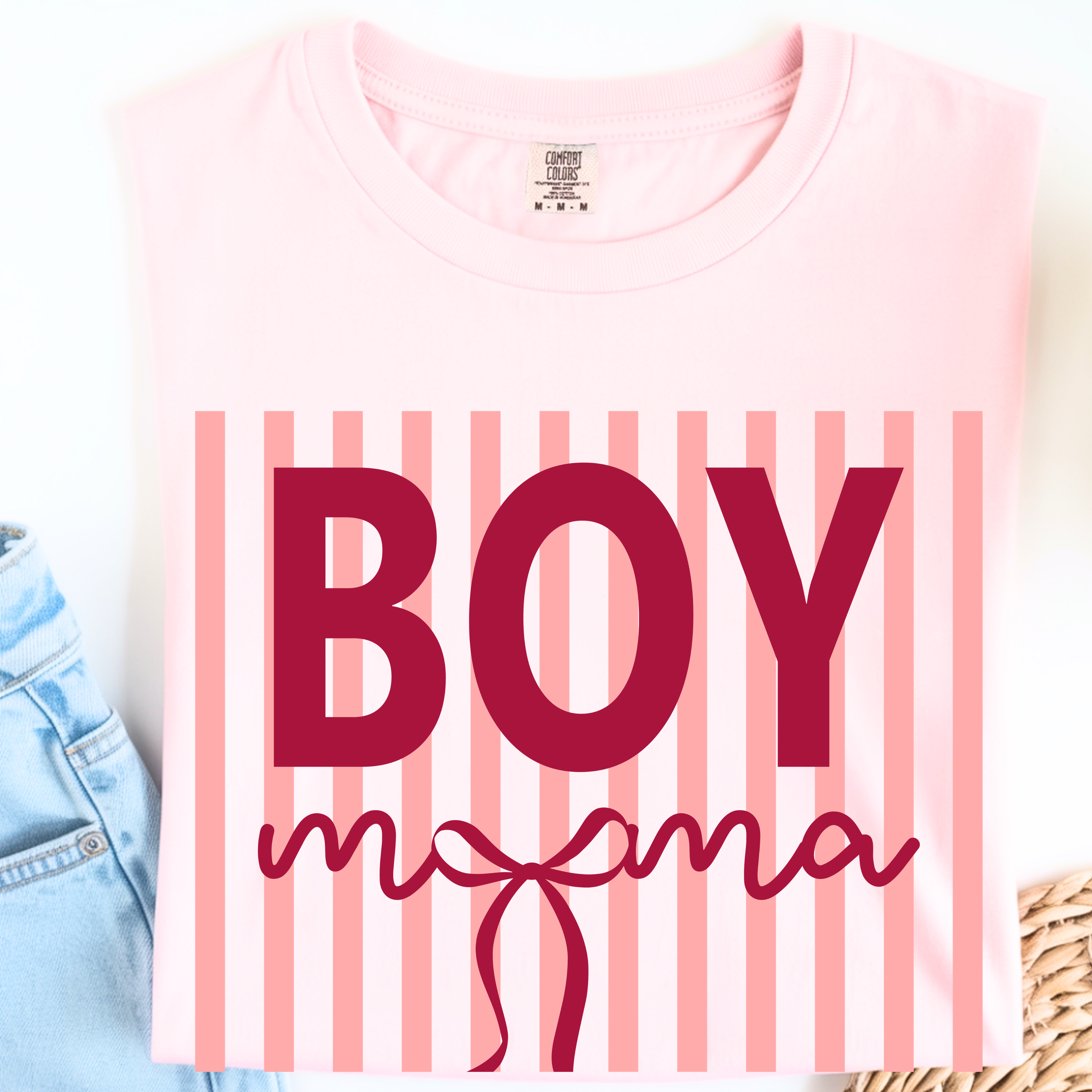 Folded Blossom Boy Mama graphic t-shirt flat lay product image