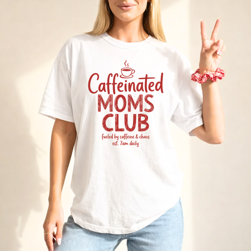 Woman wearing Caffeinated Moms Club t shirt featuring funny coffee lover mom graphic and caffeine inspired design.