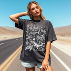 Ocean Life graphic t-shirt with detailed marine animal illustrations styled in a casual outdoor setting.