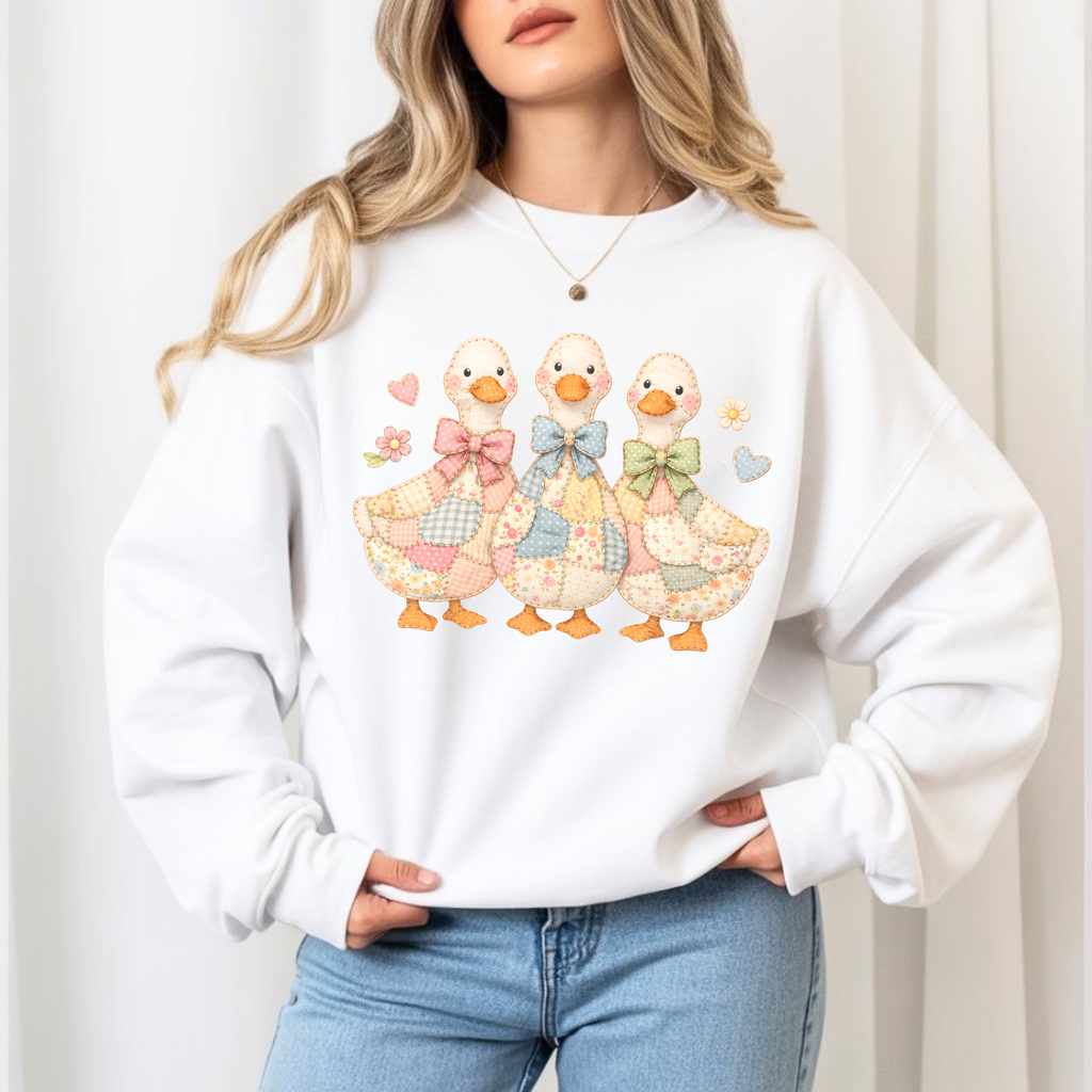 Woman wearing faux patchwork duck sweatshirt styled outfit cozy cottagecore aesthetic casual mom fashion