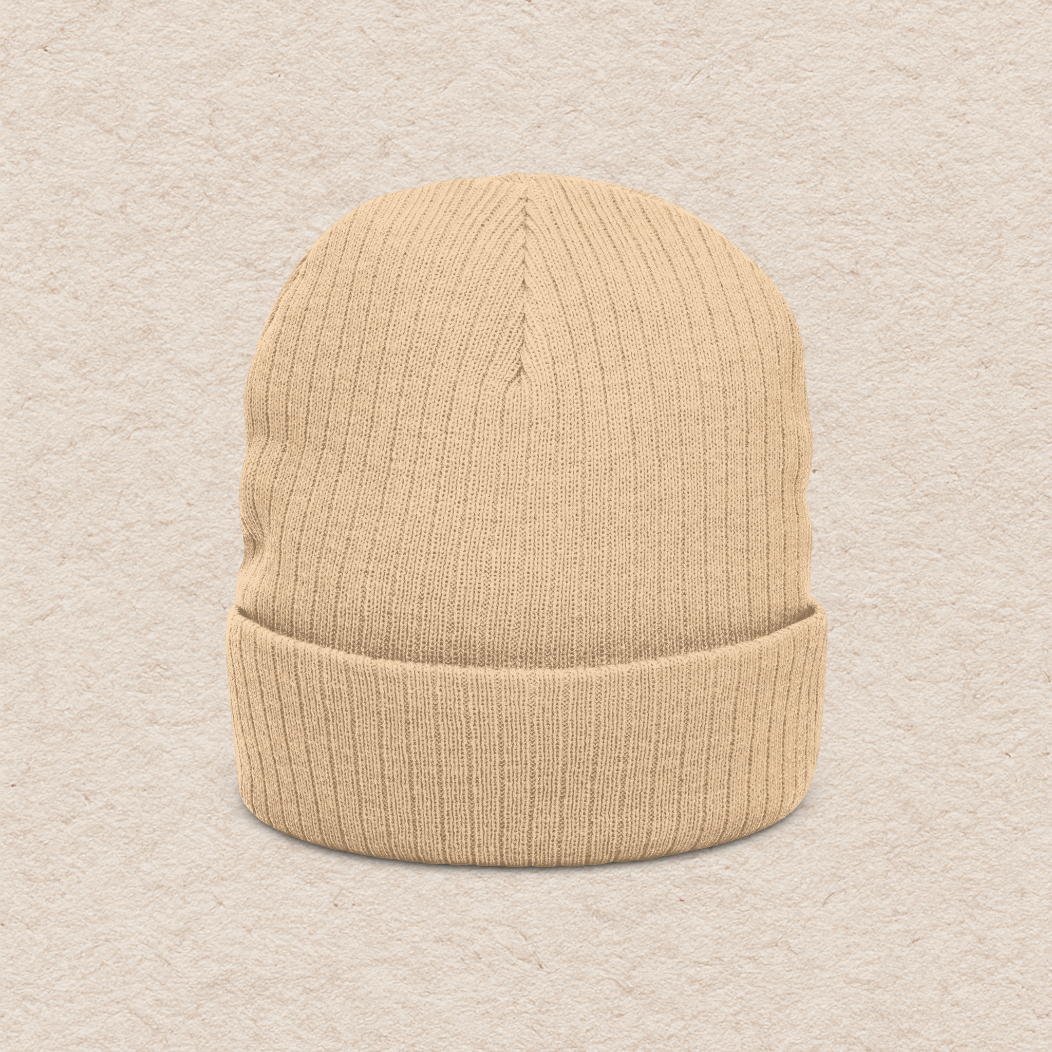 Back view of beige knit embroidered beanie with fold-over cuff design for winter wear