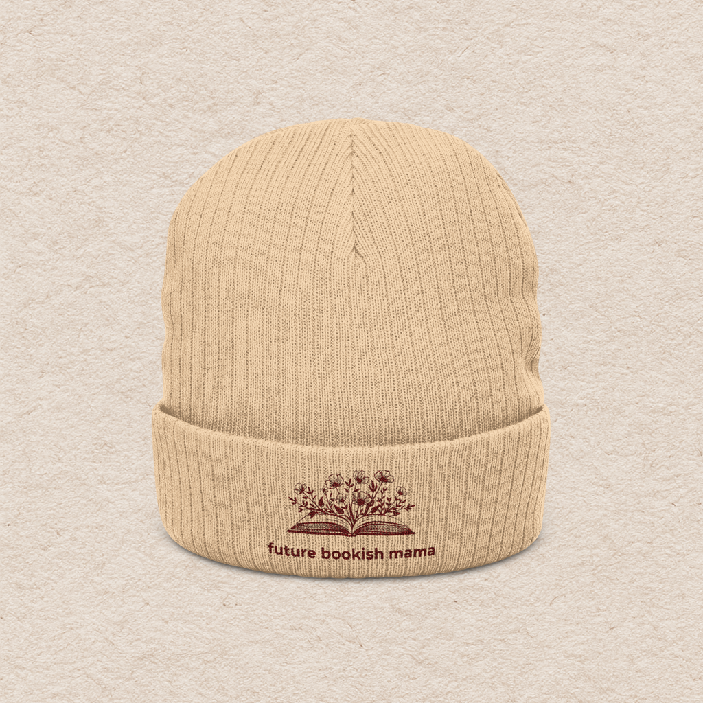 Front view of beige embroidered “Future Bookish Mama” beanie with book design, cozy winter hat for moms