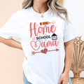 Woman wearing Home School Mama t shirt featuring pencil, heart, arrow and schoolhouse graphic design for homeschool moms.