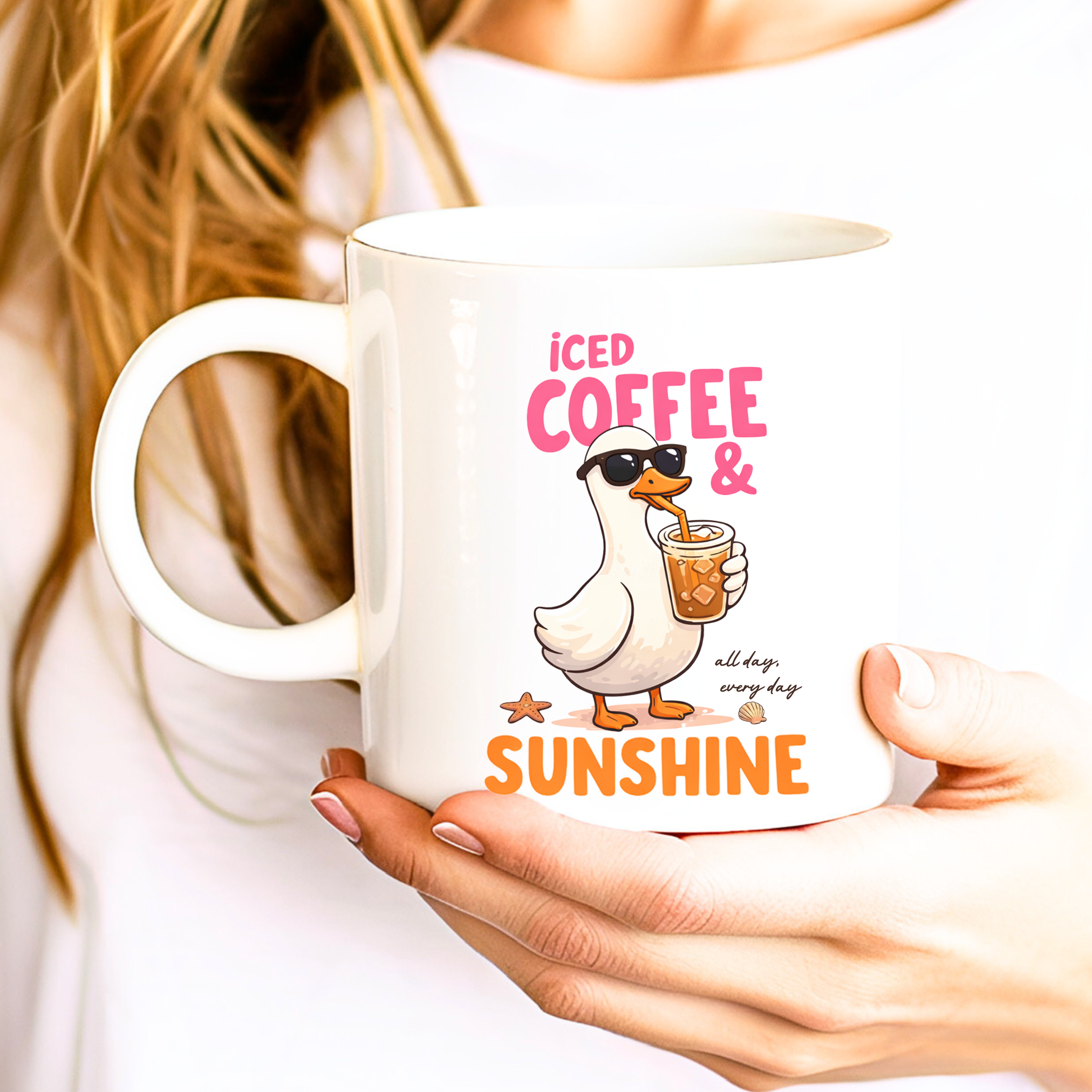 Woman holding iced coffee and sunshine mug featuring cute duck coffee lover design