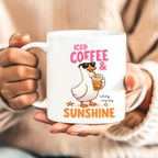 Iced Coffee and Sunshine ceramic mug featuring cute duck drinking iced coffee lifestyle mockup