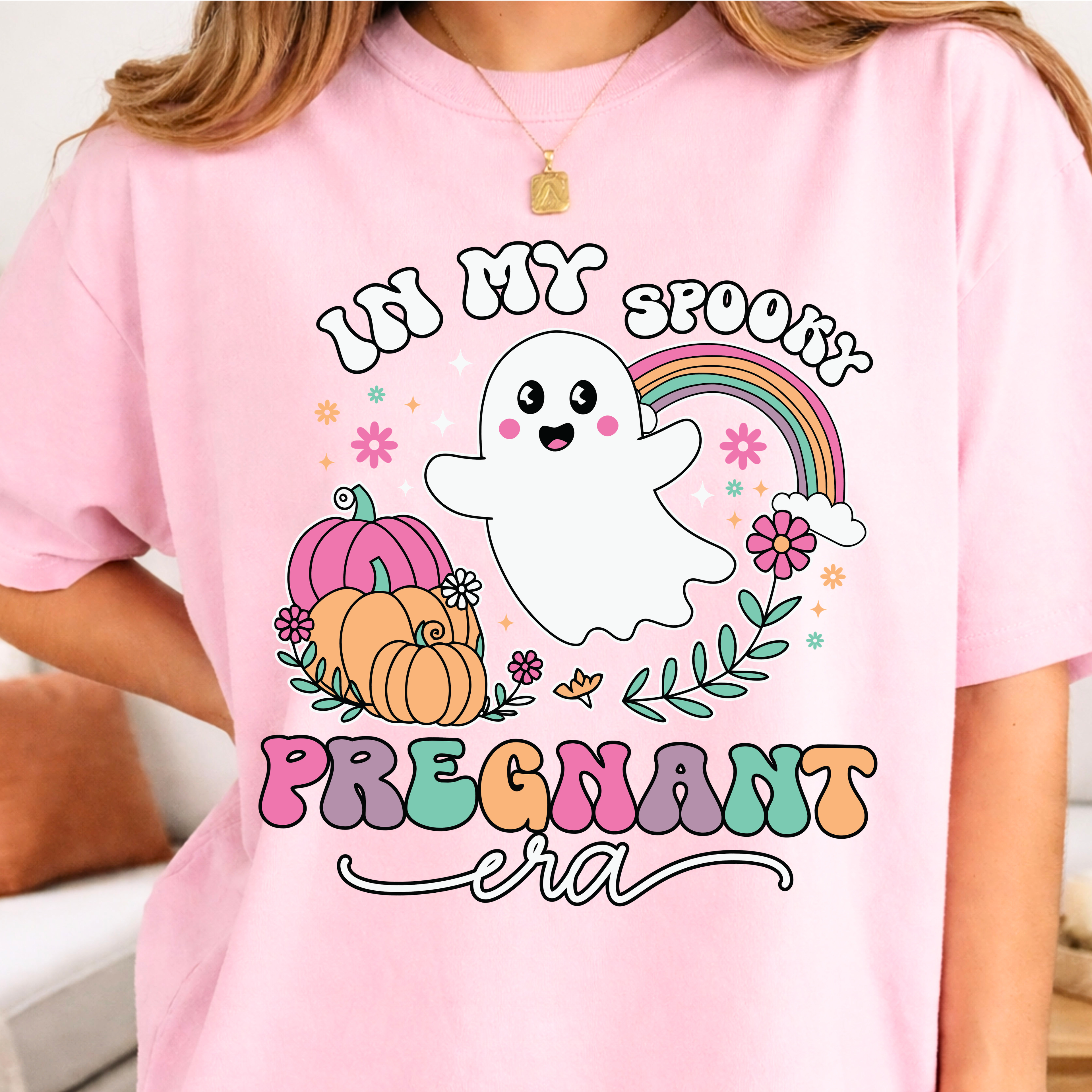 Pregnancy announcement shirt with ghost rainbow pumpkin design in blossom pink