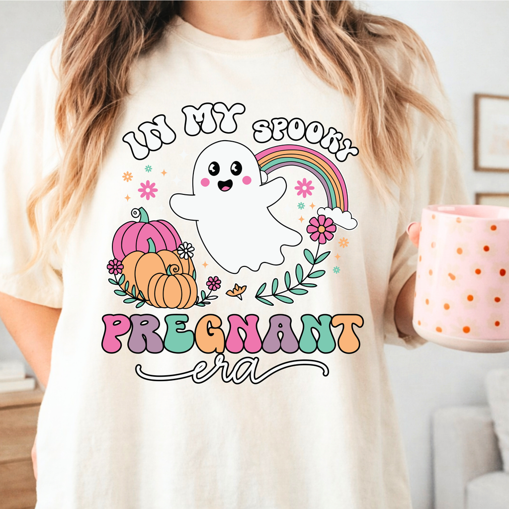 Cute Halloween pregnancy shirt featuring ghost pumpkin rainbow and In My Spooky Pregnant Era design in ivory