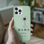 Aesthetic sage green MAMA loading est 2026 pregnancy announcement iPhone case held in hand