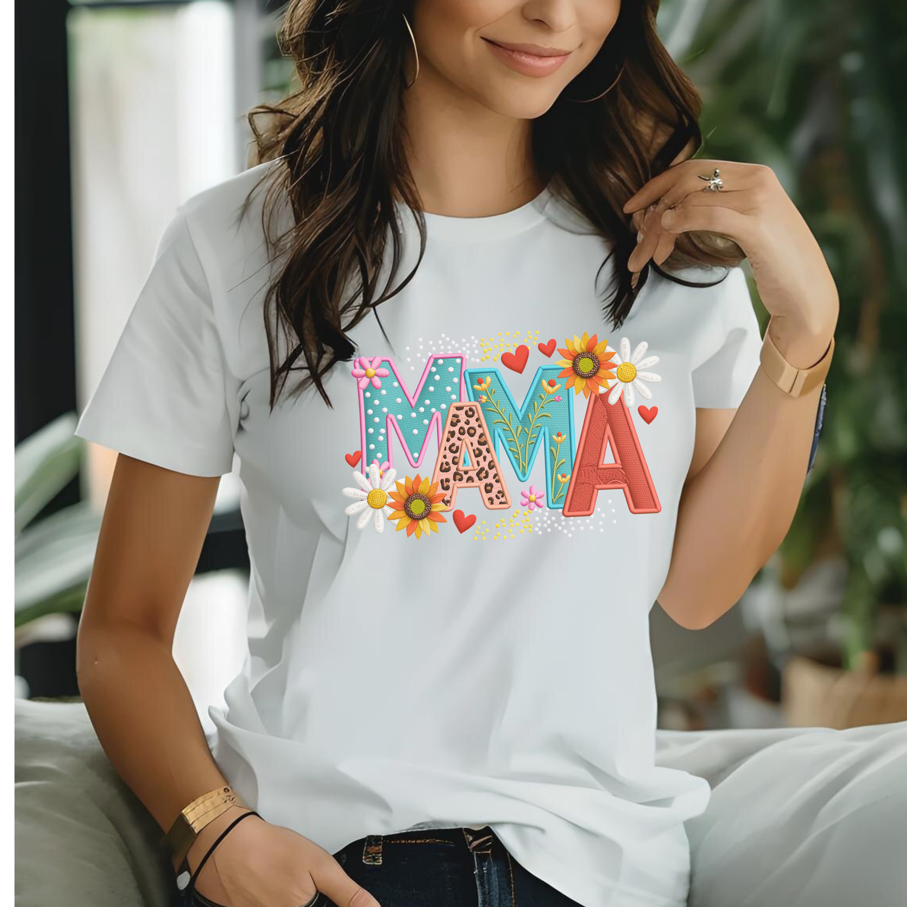 Woman wearing mama t-shirt with floral design, trendy aesthetic mom outfit