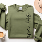 Close-up of minimal mama floral design on sweatshirt, delicate line art detail