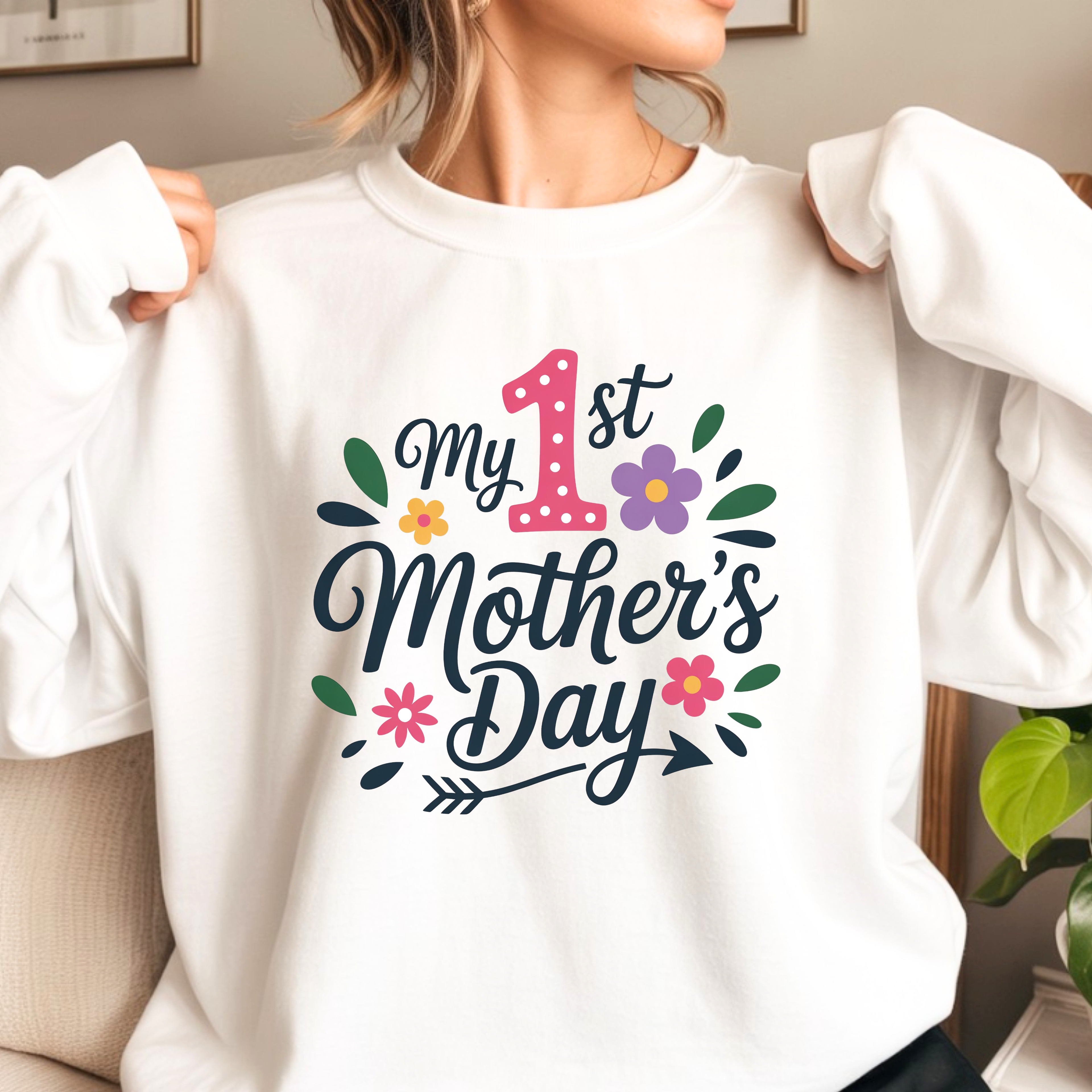 Close up of first Mother’s Day sweatshirt showing floral mama design on soft white crewneck