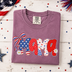 Patriotic Mama graphic t-shirt in orchid color with red white and blue Independence Day design