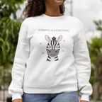 Pregnant woman wearing Striped and Expecting zebra maternity sweatshirt in white cozy crewneck for expecting moms