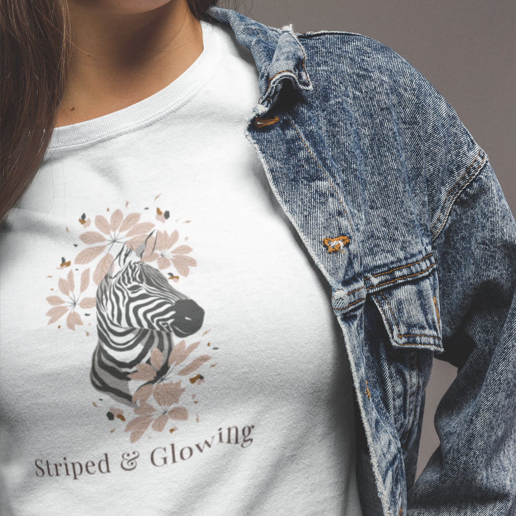 Close up of zebra floral artwork on Striped and Glow maternity t shirt stylish pregnancy graphic tee